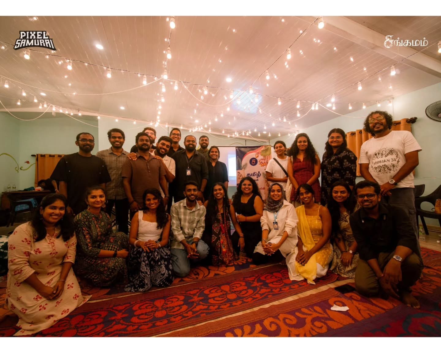 The Mozhi Sangamam community, together in one room